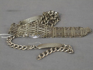 2 silver curb link identity bracelets and a silver gatelink bracelet and 2 other silver bracelets