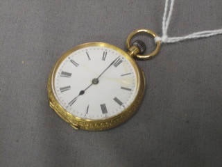 A lady's Continental open faced fob watch with enamelled dial and Roman numerals contained in an 18ct chased gold case