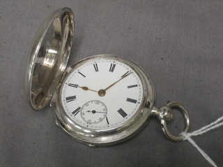A gentleman's full hunter pocket watch with enamelled dial and Roman numerals contained in a full hunter case