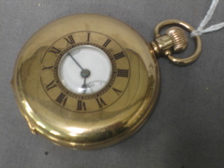 A gentleman's demi-hunter pocket watch contained in a 9ct gold case