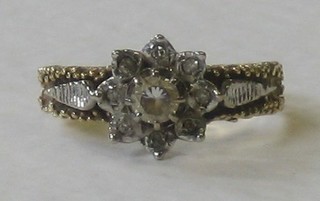 An 18ct gold cluster dress ring set diamonds