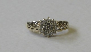 A 9ct gold cluster dress ring set diamonds
