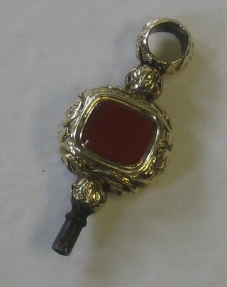 A Victorian gilt metal watch key set a hardstone