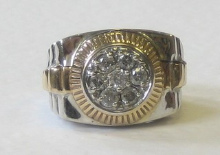 An American 10ct gold and diamond set "Rolex" dress ring