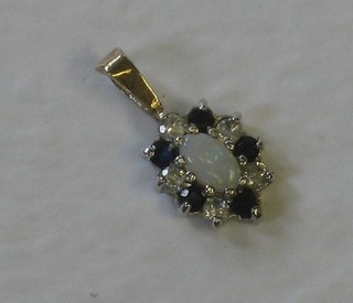A gold pendant set opals, sapphires and diamonds