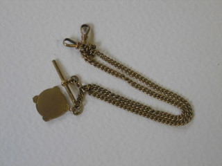 A 9ct gold curb link double Albert watch chain hung a gold medal 15"