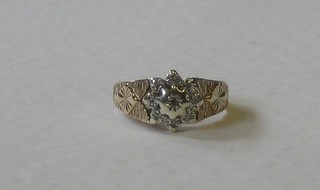 A 9ct gold cluster ring set diamonds