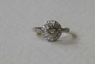 An 18ct white gold cluster dress ring set numerous diamonds