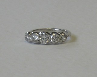 An 18ct white gold dress/engagement ring set 5 diamonds approx. 1.55ct