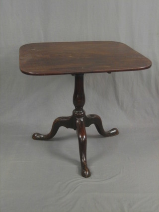 A 19th Century rectangular mahogany snap top tea table, raised on pillar and tripod supports 32"