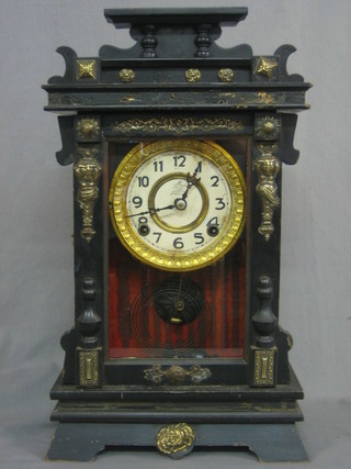 An American 8 day striking shelf clock with paper dial and Arabic numerals contained in an ebony and gilt mounted case