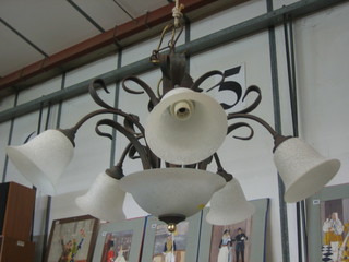 A metal 5 light electrolier with glass shades