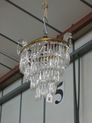 A 4 tier circular drop electrolier hung lozenges