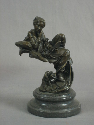 An Art Nouveau style bronze figure of a musing seated lady with hand mirror and seated dog 10"