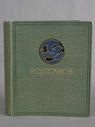 A green card postcard album containing approx 86 various black and white postcards of Trams and Omnibuses