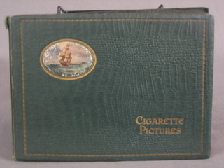 An album of various cigarette cards including Lambert & Butler Motor Cars, Mitchells  Steam Ships, Players Butterflies etc