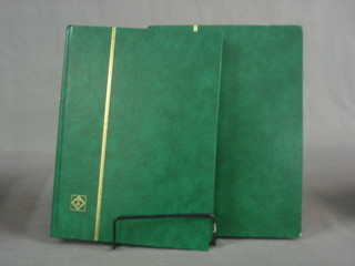 2 green stock books of stamps