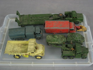 A  Dinky Super Toy tank transporter 660, a do.  recovery tractor 661, a pressure re-fueller 642, a Dinky Super Toy GUY lorry, a Euclid rea dumper trunk 965, do. armoured personnel carrier, artillery tractor and a Lesney No.13 wreck truck