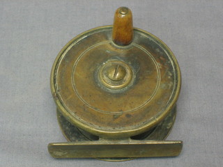 A 19th Century brass centre pin fishing reel 2 1/2"