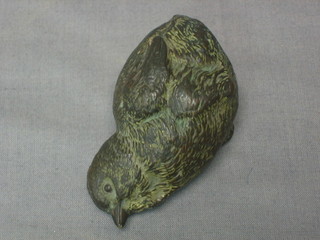 A bronze figure of a seated chick 2"