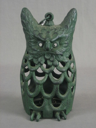 A pierced iron garden lantern in the form of an owl 10"