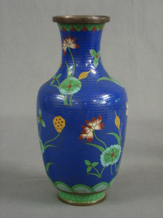 A blue ground cloisonne club shaped vase with floral decoration 10"