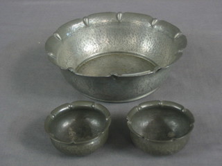 A circular planished pewter bowl, the base marked Dansk Kunst 7" & 2 salts 2"