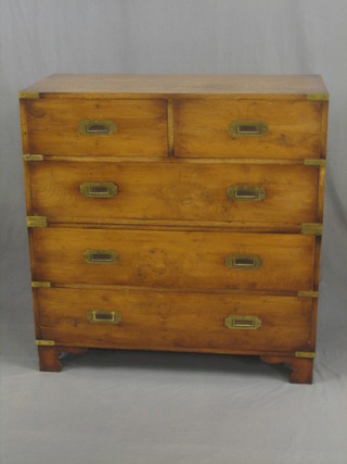 A 19th Century style yew military chest fitted 2 short and 3 long drawers, raised on bracket feet 36"