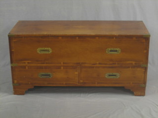 A 19th Century style yew mule chest with hinged lid, the base fitted 2 long drawers, raised on bracket feet 42"