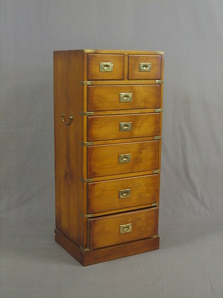 A 19th Century style military pedestal chest of 2 short and 5 long drawers, raised on a platform base 18"