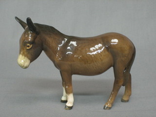A Beswick figure of a standing donkey 4 1/2"