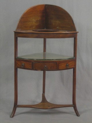A Georgian mahogany 3 tier corner wash stand with 3 bowl recesses, raised on splayed feet 23"