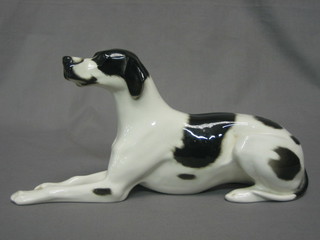 A Soviet Russian porcelain figure of a seated black and white dog 11"