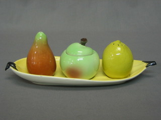 A Carltonware 3 piece condiment set in the form of an apple, pear and lemon (lemon cracked)