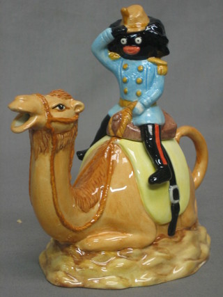A Carltonware teapot in the form of a seated  camel with Gollywog rider