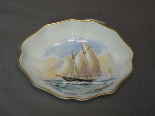 A Royal Crown Derby oval porcelain pin tray decorated a 2 masted yacht, the reverse marked America and the front signed W E J Dean, 4"