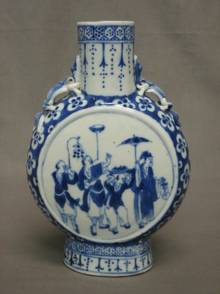 An Oriental blue and white porcelain twin handled moon flask decorated court figures 7 1/2"