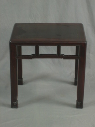 A rectangular Padouk occasional table, raised on club supports 18"
