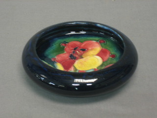 A circular Moorcroft dish decorated an anemone 4"