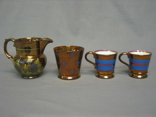 A 19th Century copper lustre jug 4", do. beaker and 2 cups
