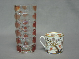 A 19th Century porcelain cup 2 1/2" and a 1950's Art Glass vase 7" (2)