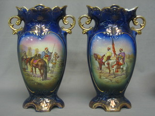 A pair of Edwardian twin handled vases decorated Arab Scenes (1 with chip to rim) 12"