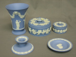 A Wedgwood blue Jasperware trumpet shaped vase 6" do. jar and cover 4" and 3 other items of Jasperware