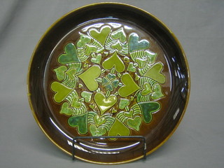 A Poole Pottery green glazed circular platter by Diane Davis 13"