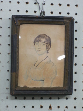 A 19th Century portrait miniature of "M A Jarrett" 5 1/2" x 4" labelled to the reverse