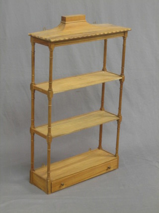 A Georgian style bleached mahogany 3 tier hanging what-not