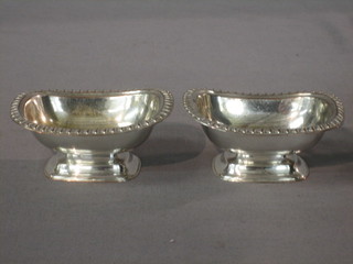 A pair of Georgian style silver plated boat shaped salts 4"