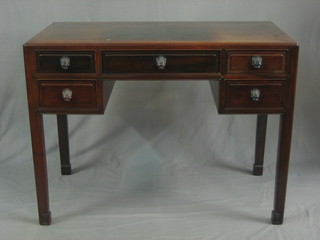 An Oriental Padouk desk/dressing table fitted 1 long drawer flanked by 4 short drawers, raised on square supports 42"