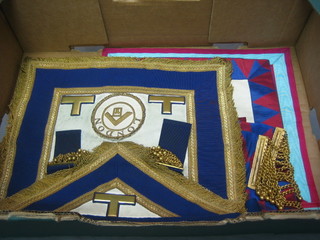 A  quantity of various Masonic regalia comprising London Grand Rank apron, Royal Arch Principles apron and sash and a Mark Master Masons apron