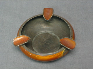 A circular Art Deco Continental silver and orange enamel ashtray (f)